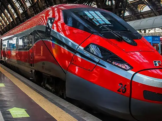 Red Futuristic Train from Rail Europe at the Station