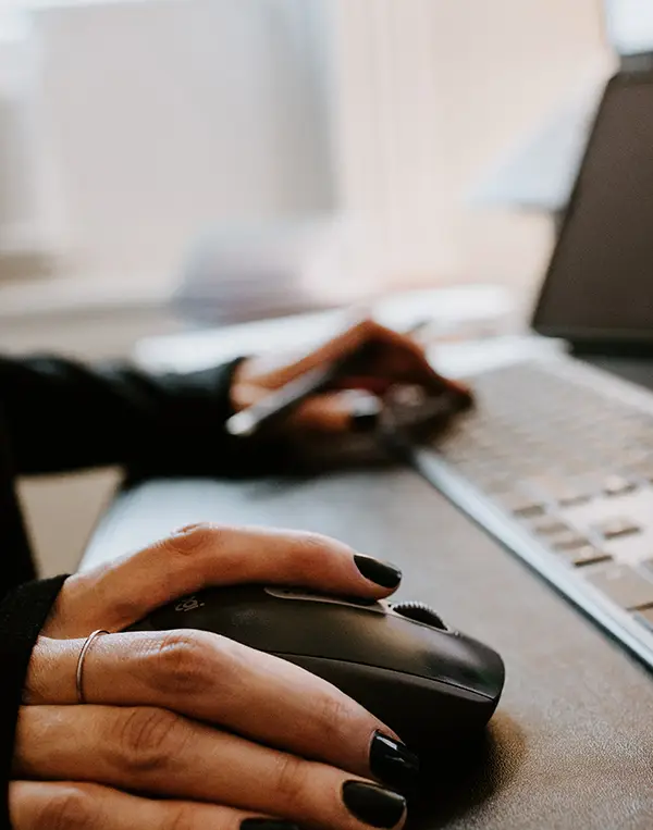 zoom in on hands on mouse and keyboard